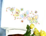 Jack Dempsey Needle Art Fluttering Butterflies Perle Edge Pillowcase